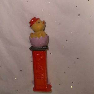 Vintage Retrospect Pez NIB Porcelain, Yellow Chick In Purple Egg, Red Hat, Metal